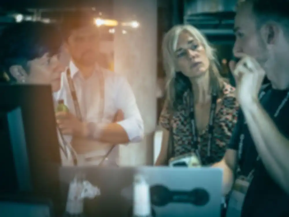 Conference participants talk