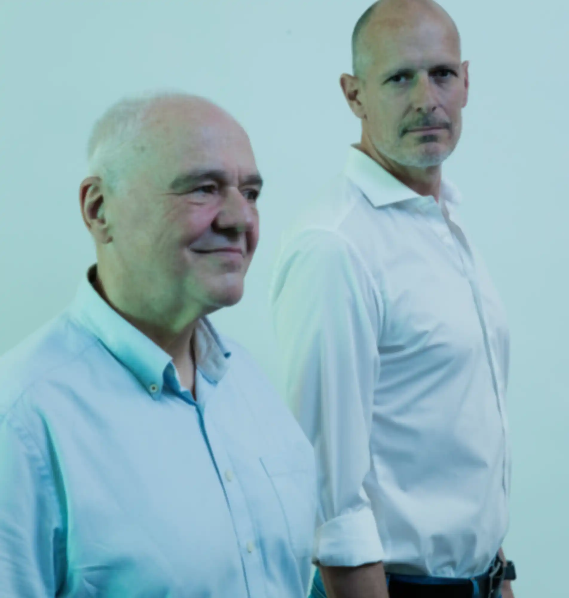 Portrait von zwei Teammitgliedern