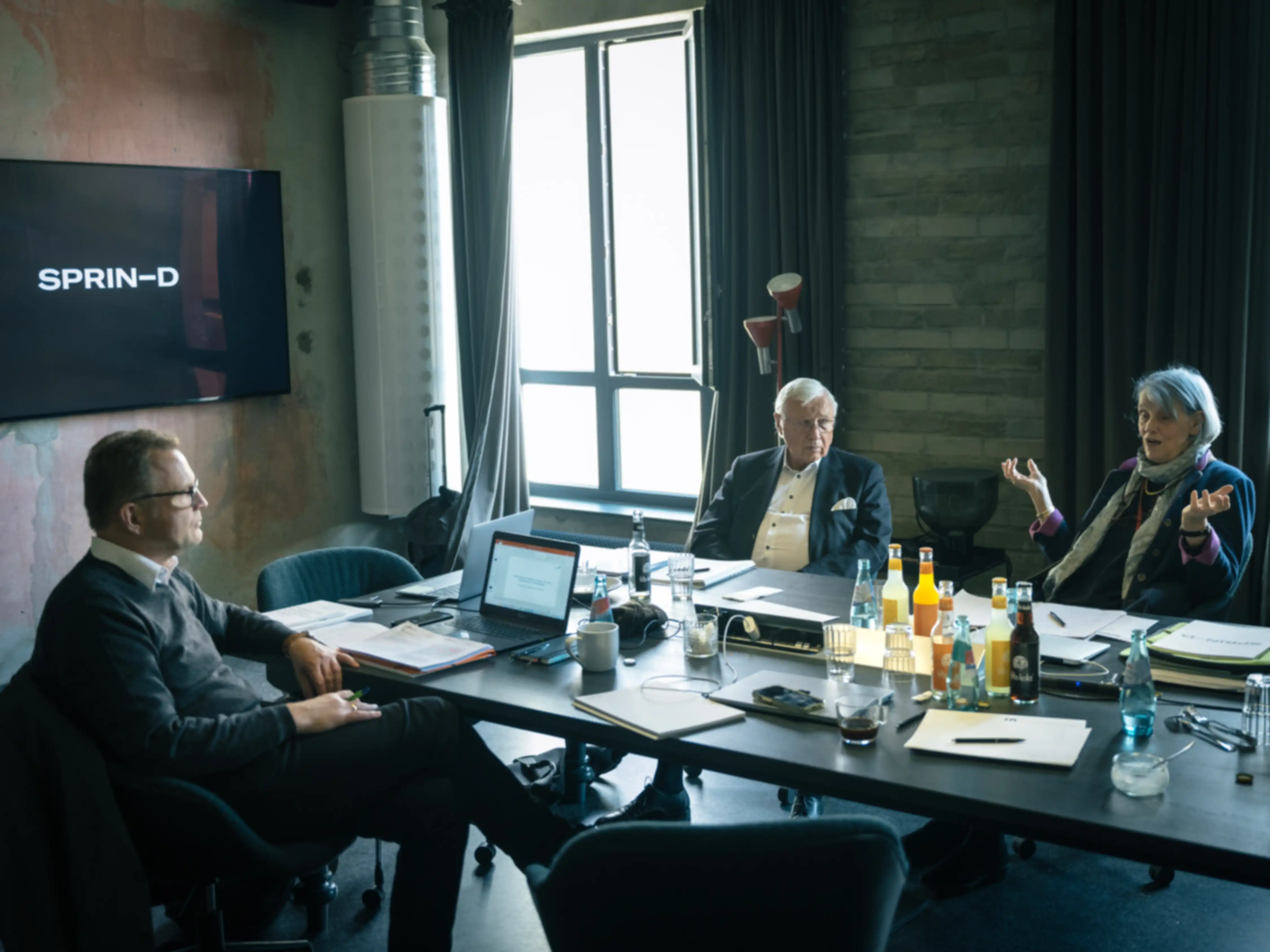 Three people during the jury session