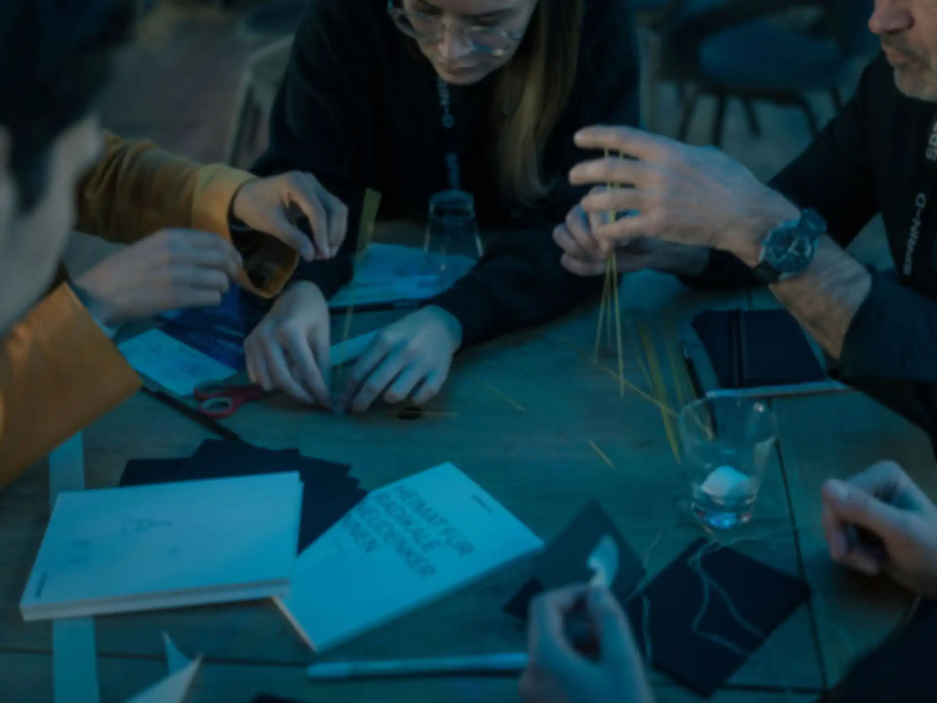 Several people are building a model.