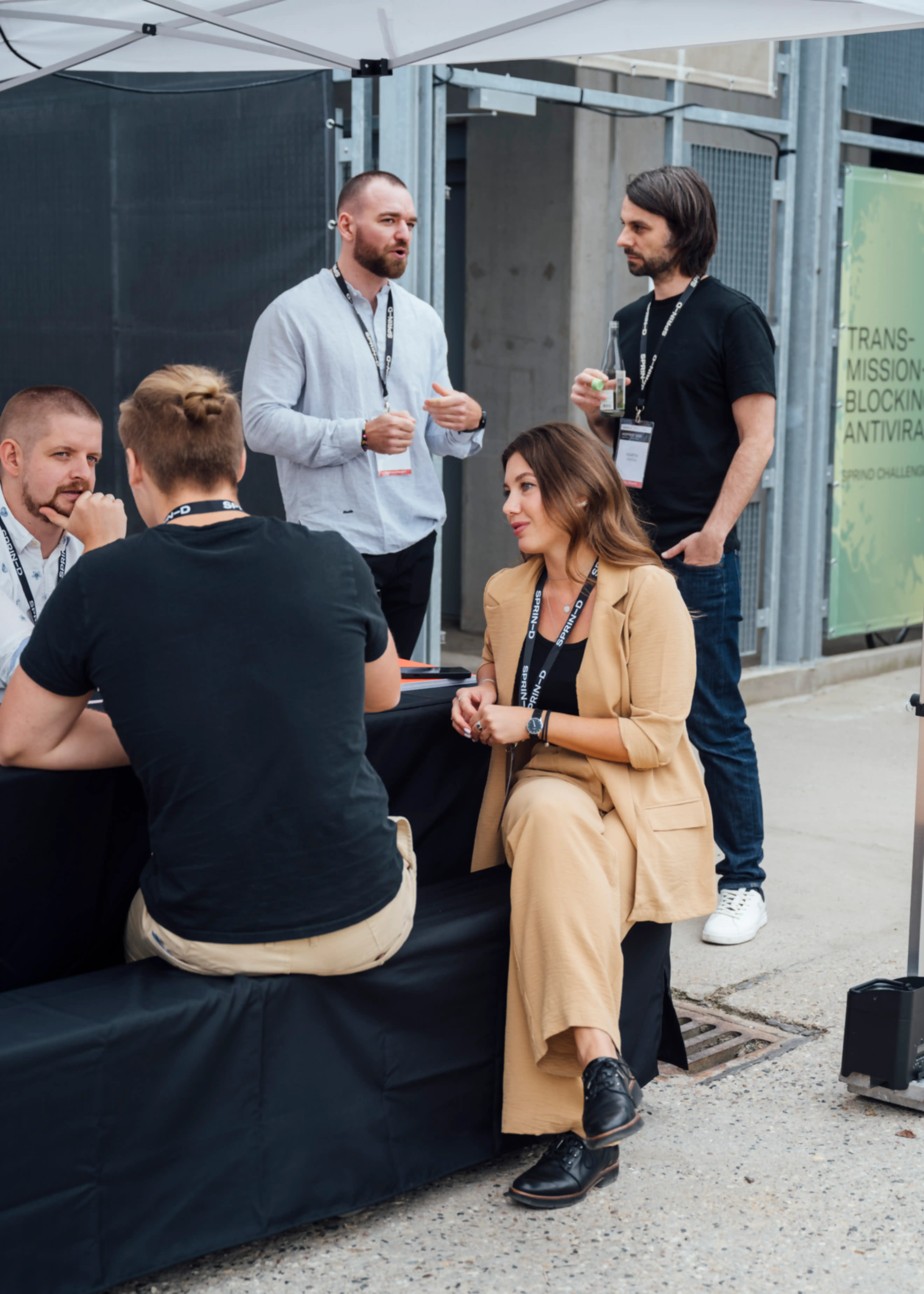 Several people talking outdoors