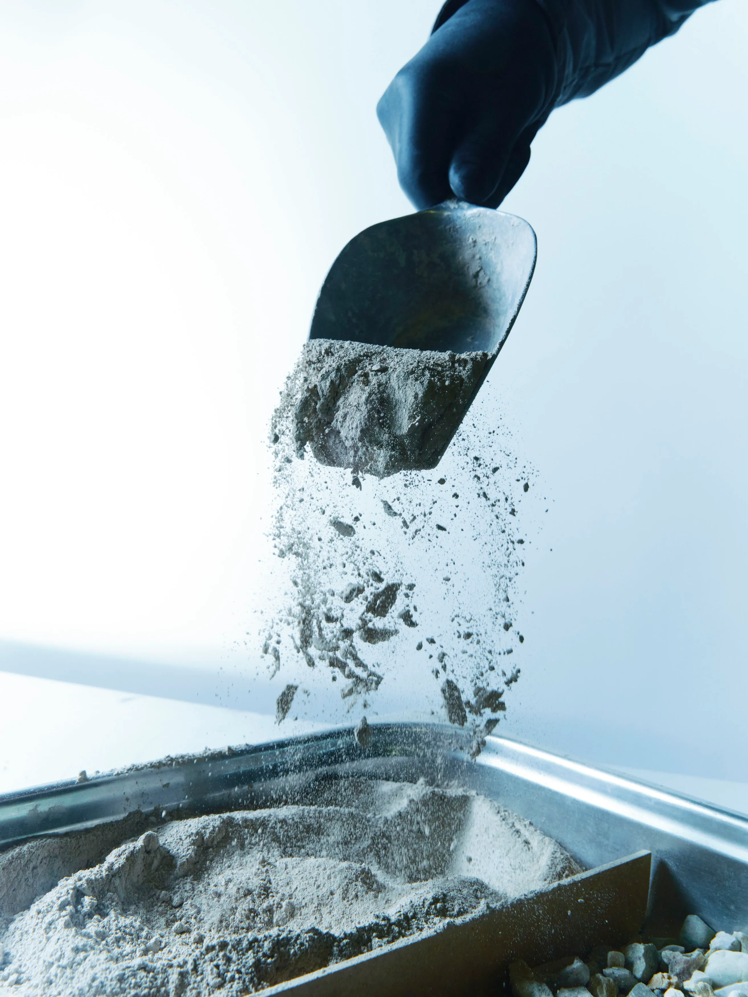 Shovel with cement powder