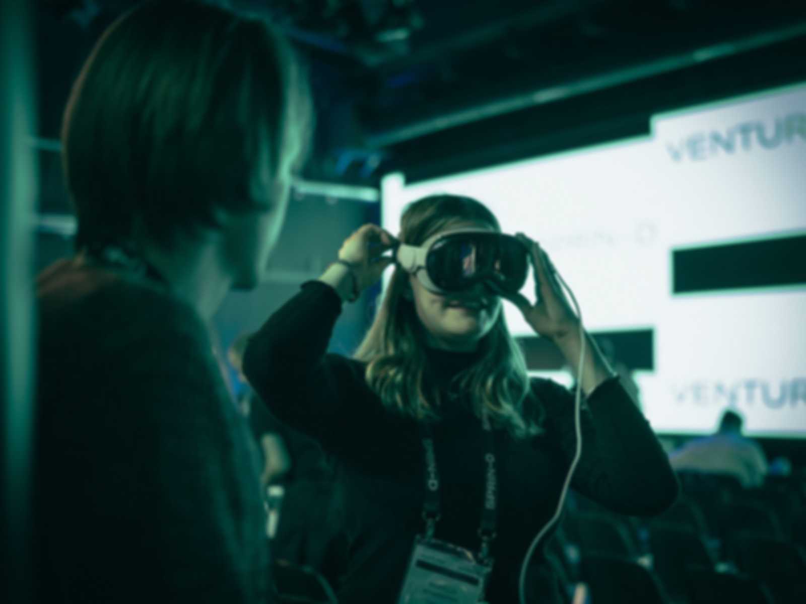 A Woman using VR goggles