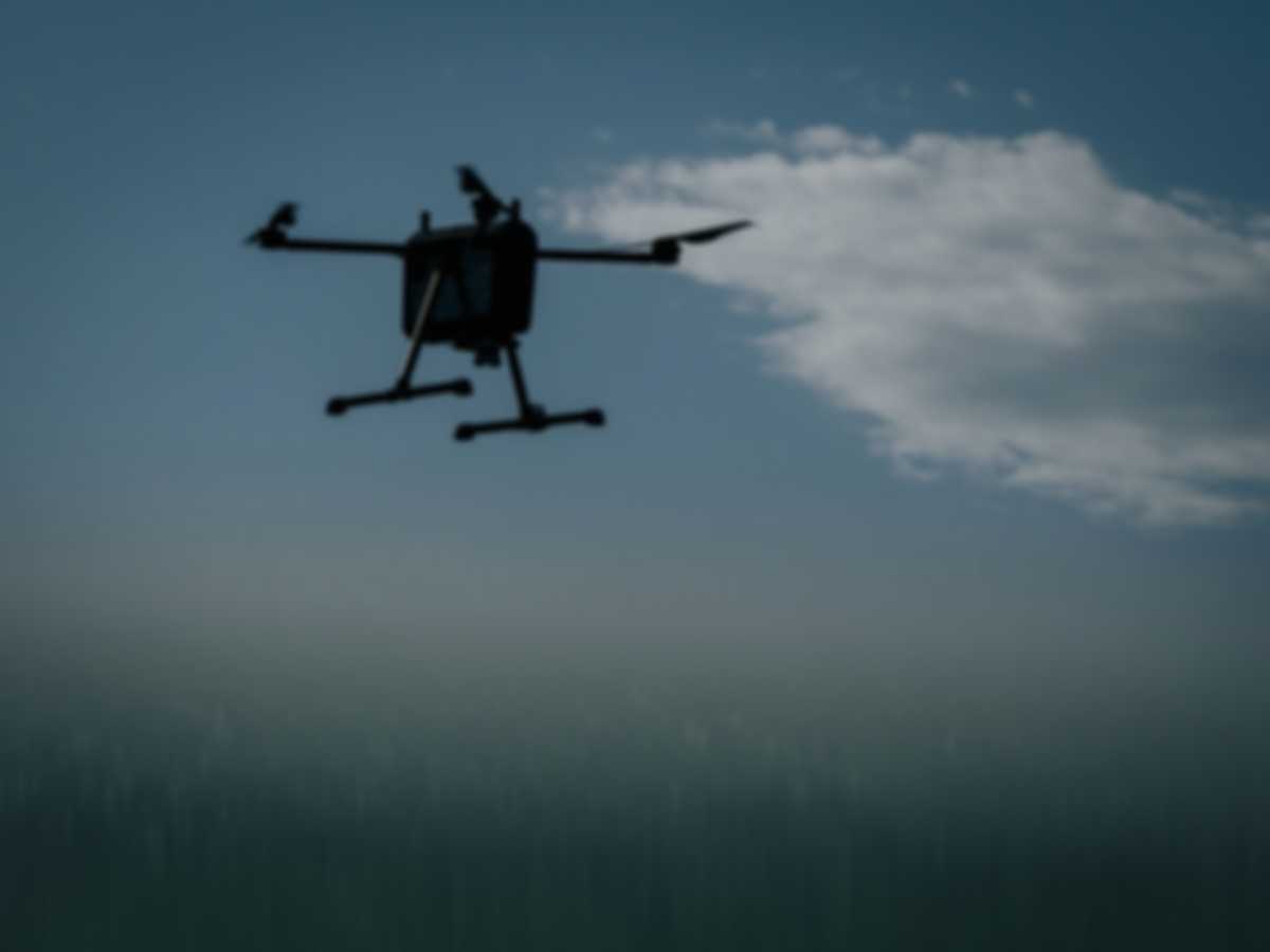 A drone flies in the sky